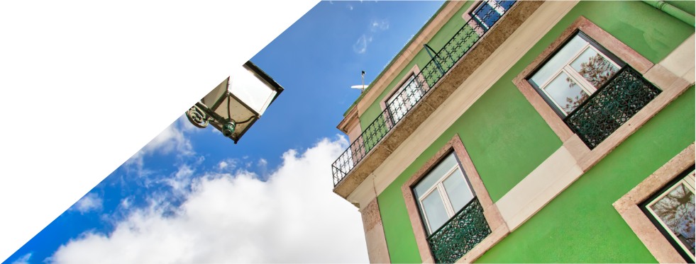 Fachada de casa de cor verde